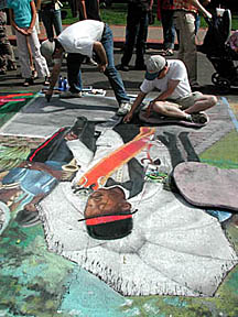 Wayne and David stretch to work on the brick paving