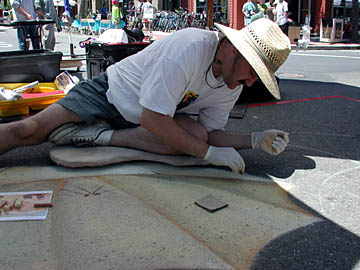 Wayne paints umbrellas