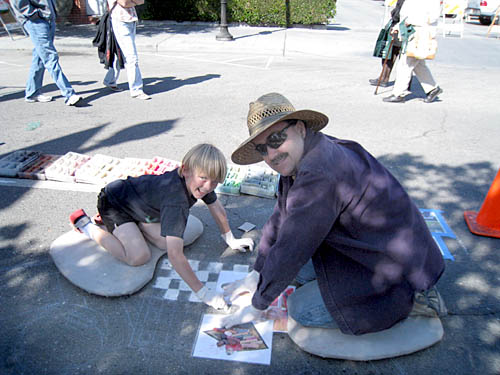 Nolan helps Wayne with the checkerboard