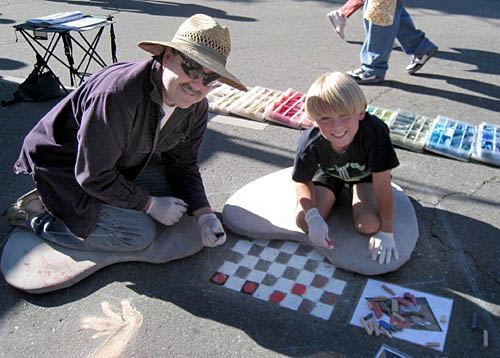 Wayne and Nolan add the black squares and the checkers