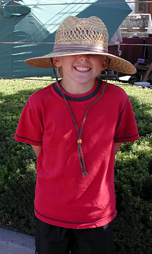 Nolan wears Cheryl's hat