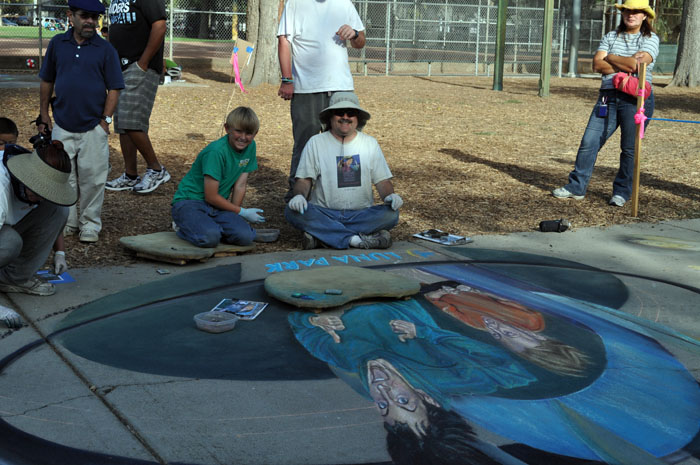 Nolan helps Uncle Wayne paint