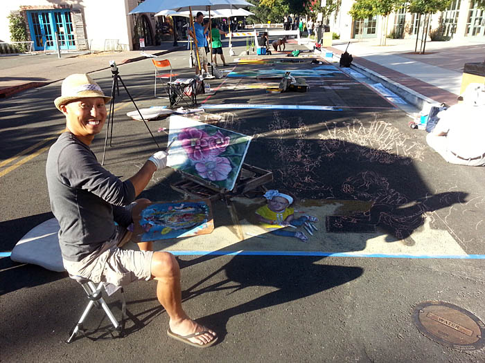Joel poses with the painting